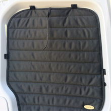 One tie is used per rear door pair curtain.  Extra magnets are placed inside upper pouches